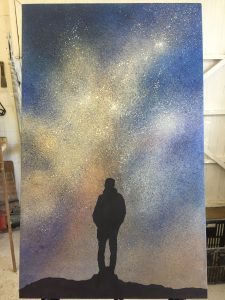 silhouette figure with starry skies