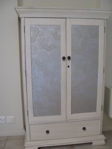 panels painted in faux wallpaper