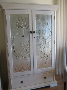 silver leafed panels with coral painting