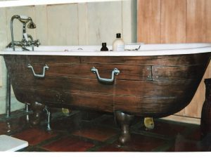faux wood and metal handles painted onto bath