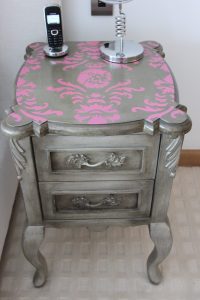 aged bedside table with funky stencil design