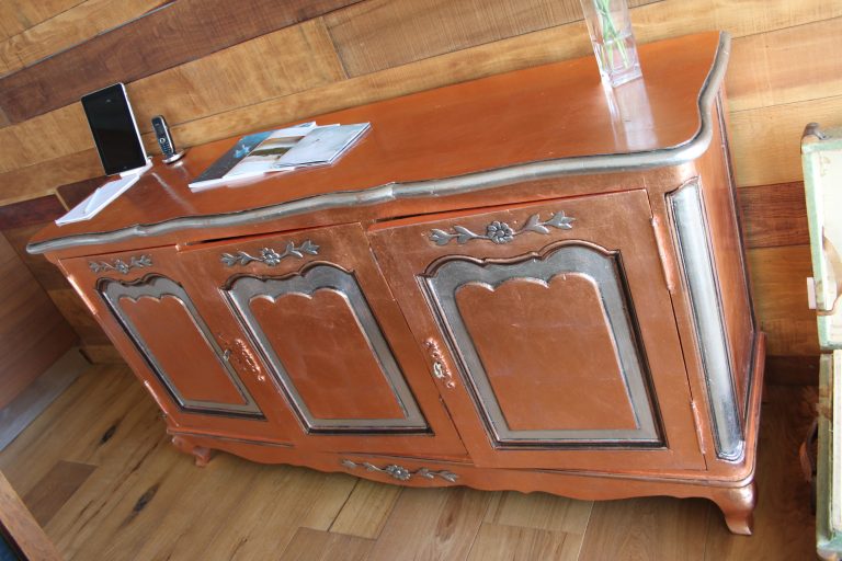 copper and silver leafed server