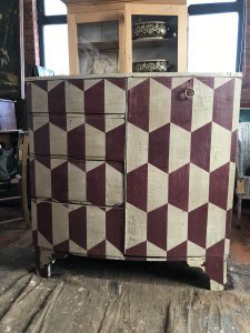 harlequin patterned cabinet